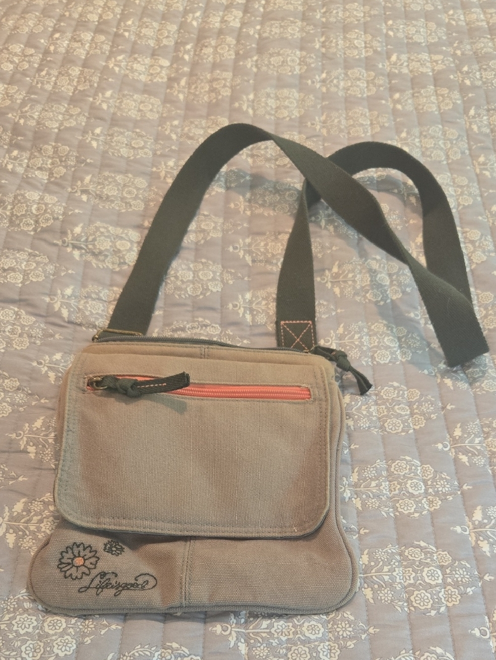 Life Is Good Taupe Canvas Crossbody Bag with Black Strap and Orange Accent
